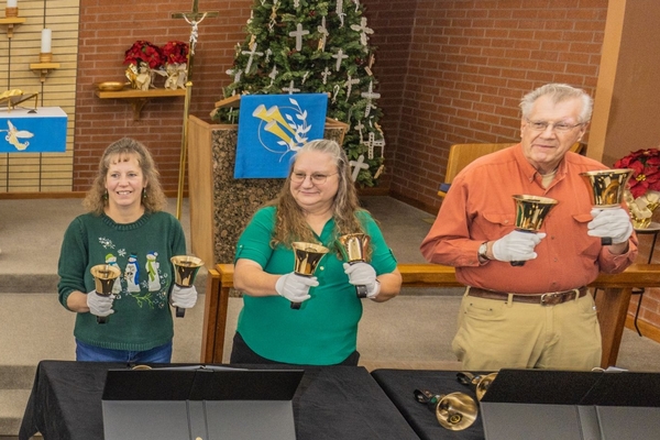 People holding handbells